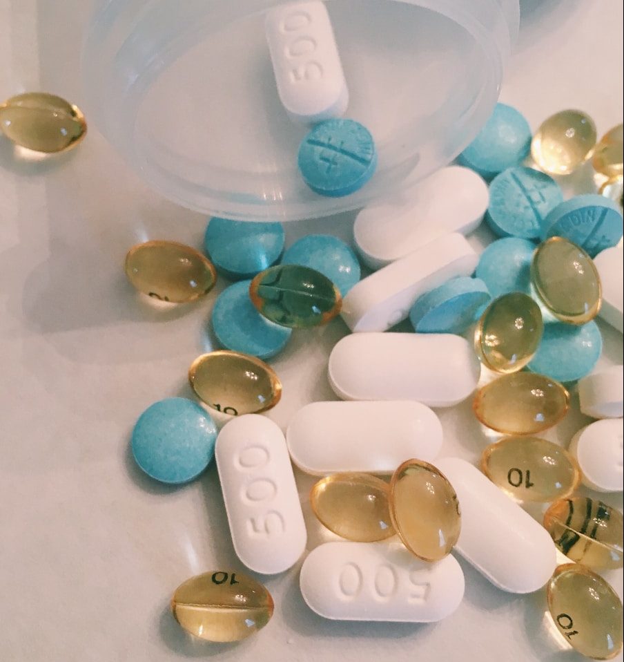 assorted-color medication pills